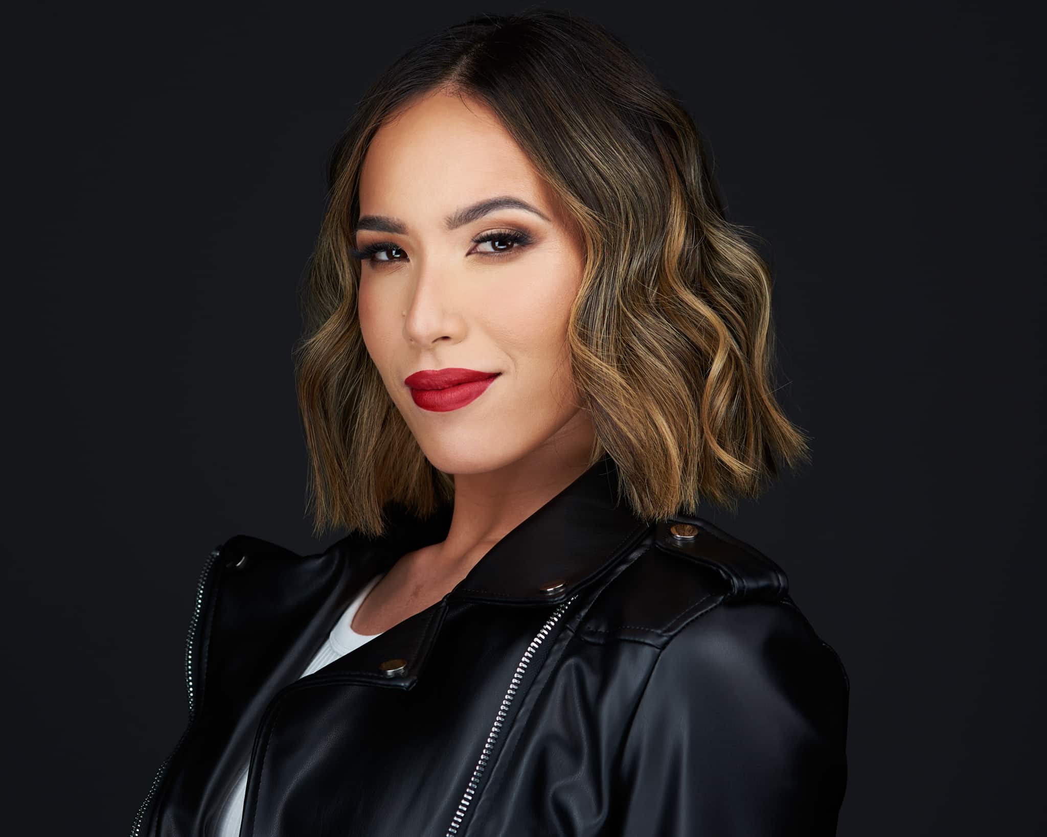 Las Vegas headshot photographer — creative editorial woman studio portrait with dramatic hat