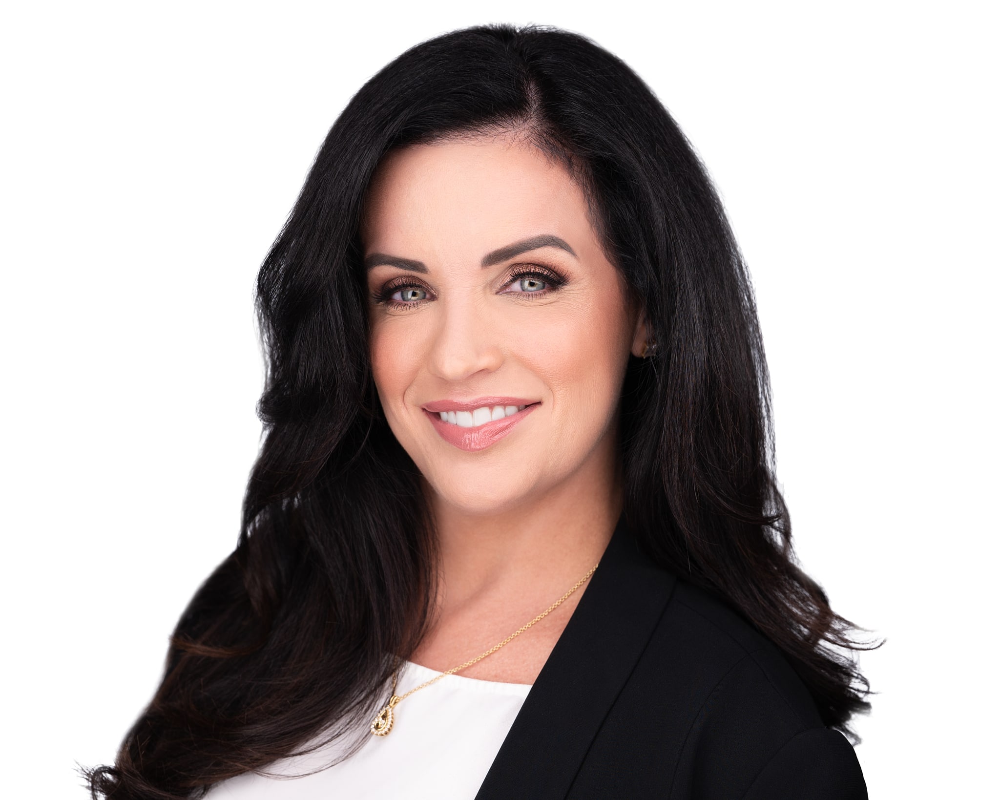 Lawyer headshots Las Vegas — professional woman blue blazer confident studio portrait